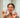 Woman holding Honor Colostrum and Lavender Whipped Tallow #package-type_lavender