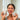 Woman holding Honor Colostrum and Lavender Whipped Tallow #package-type_lavender